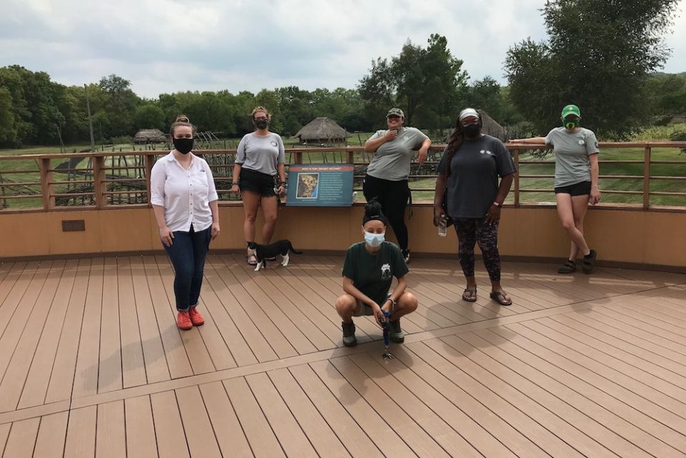 Notre Dame Mission Volunteers-AmeriCorps' Dayton, Ohio, team, pose at Sunwatch Indian Village/Archaeological Park. Notre Dame Mission Volunteers-AmeriCorps' Dayton, Ohio, team, pose at Sunwatch Indian Village/Archaeological Park.