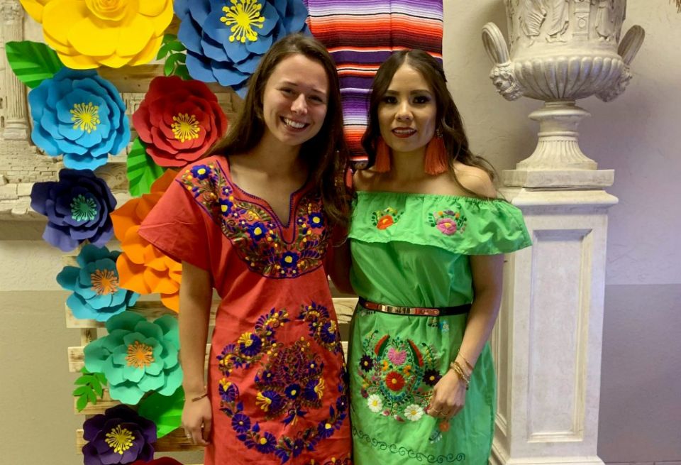 Mari, right, and me in our Mexican dresses at her brother's despedida de solteros. (Provided photo)