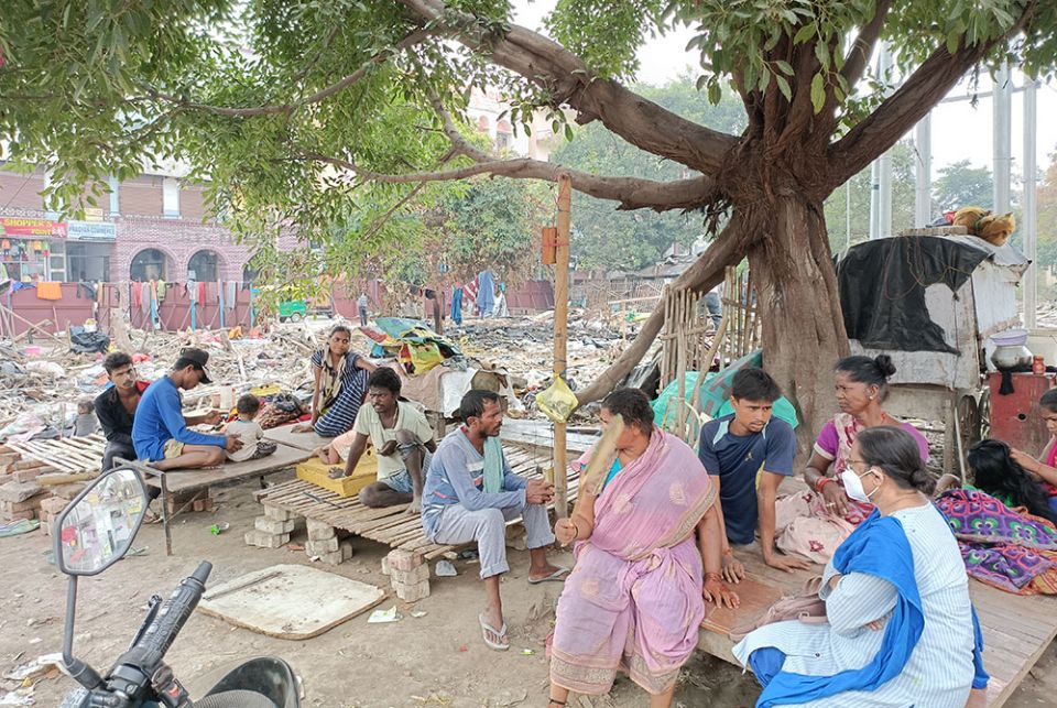 People sit at the site of their demolished homes Oct. 9 in Malaai Pakkdi, a settlement in Kankarbagh, Patna city, in Bihar state, in India. (Courtesy of Dorothy Fernandes) People sit at the site of their demolished homes Oct. 9 in Malaai Pakkdi, a settlement in Kankarbagh, Patna city, in Bihar state, in India. (Courtesy of Dorothy Fernandes)