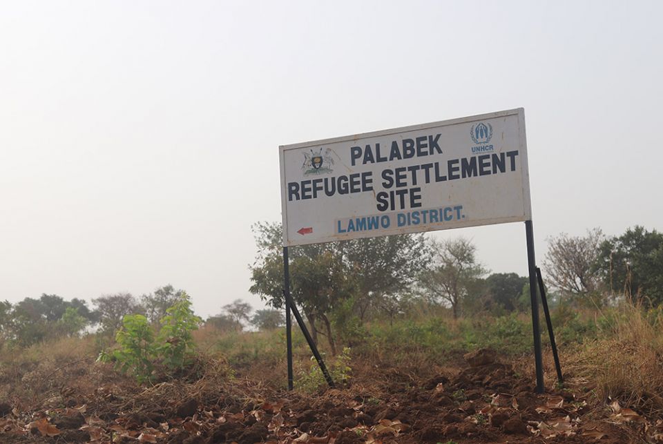 A signpost for Palabek refugee camp in northern Uganda. The camp is a home to more than 50,000 refugees from neighboring South Sudan, a country that descended into civil war in 2014 just a few years after independence. (GSR photo/Doreen Ajiambo)