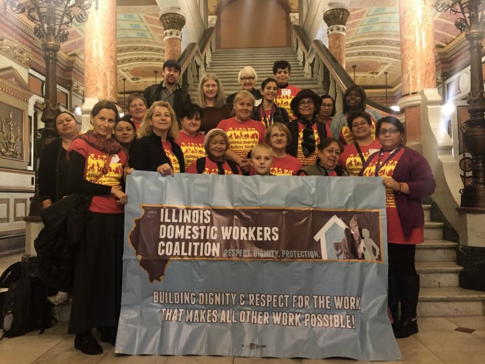 Sr. Rose Mary Meyer, top row center, poses with members of the Domestic Workers' Coalition at the Illinois capitol. (Courtesy of Sr. Rose Mary Meyer)