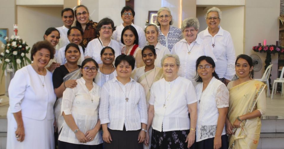 Congregation of the Sacred Hearts of Jesus and Mary sisters with Mother General Patricia Villarroel Garay and the vicar Aurora Laguarda during a final vows ceremony in the Philippines in May 2019 of first Filipina Sacred Heart sister, Ellen Buyuccan, cent Congregation of the Sacred Hearts of Jesus and Mary sisters with Mother General Patricia Villarroel Garay and the vicar Aurora Laguarda during a final vows ceremony in the Philippines in May 2019 of first Filipina Sacred Heart sister, Ellen Buyuccan, cent
