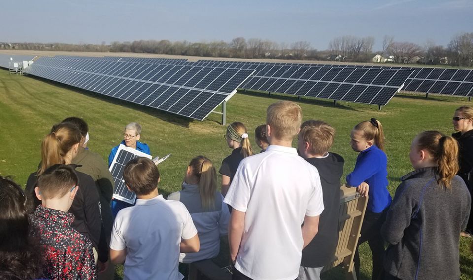 Middle school students take a tour of the solar array that helps power the motherhouse of the Congregation of Sisters of St. Agnes in Fond du Lac, Wisconsin. (Courtesy of the Congregation of Sisters of St. Agnes)
