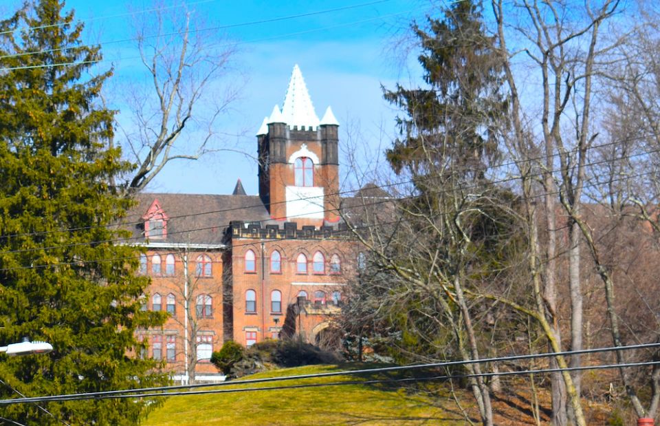 The Sisters of St. Francis of Millvale motherhouse sits vacant on a hill above the Pittsburgh borough of Millvale, sold when the community merged with four other Franciscan congregations. (Julie A. Ferraro)