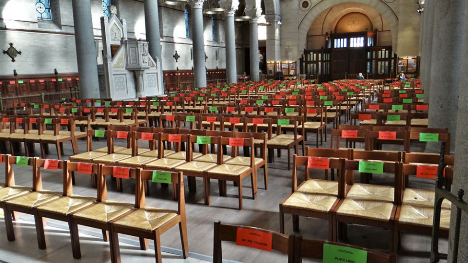 Seats are marked for social distancing in the Church of Saint-Pierre de Montrouge in Paris during the coronavirus pandemic in May 2020. (Wikimedia Commons/Ibex73)