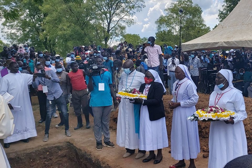 South Sudan burial of Srs. Mary Daniel Abut and Regina Roba Sisters and members of the Archdiocese of Juba, South Sudan, attend the Aug. 20 burial of Srs. Mary Daniel Abut and Regina Roba, Sisters of the Sacred Heart who were killed when their bus was attacked Aug. 16. (Courtesy of Christy John)