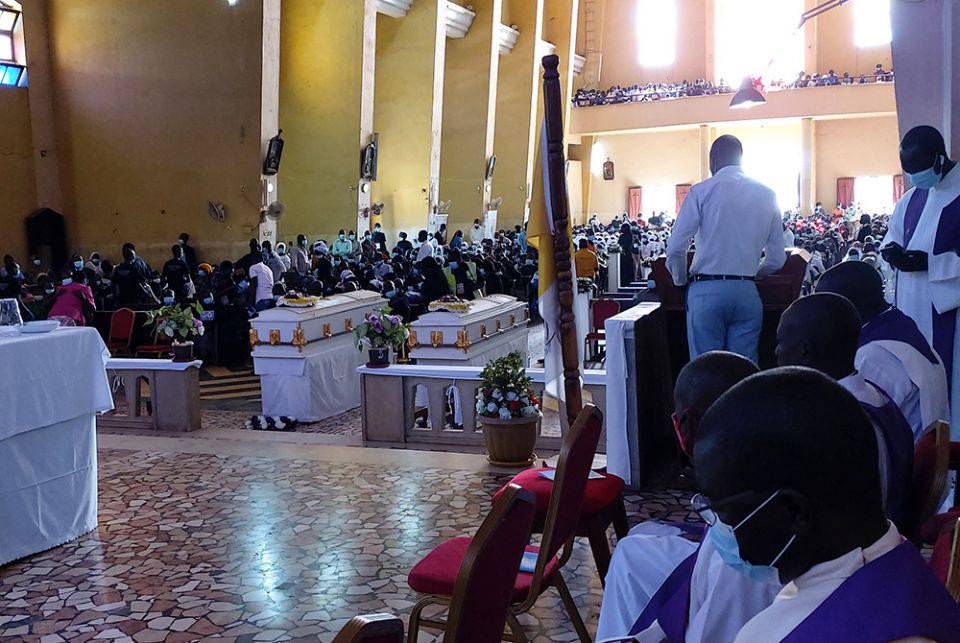 Members of the Archdiocese of Juba, South Sudan, attend the Aug. 20 funeral Mass of Srs. Mary Daniel Abut and Regina Roba, Sisters of the Sacred Heart who were killed when their bus was attacked Aug. 16. (Courtesy of Christy John)