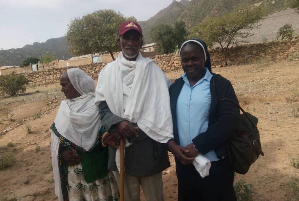 Habited sister with a man and a woman in Ethiopia