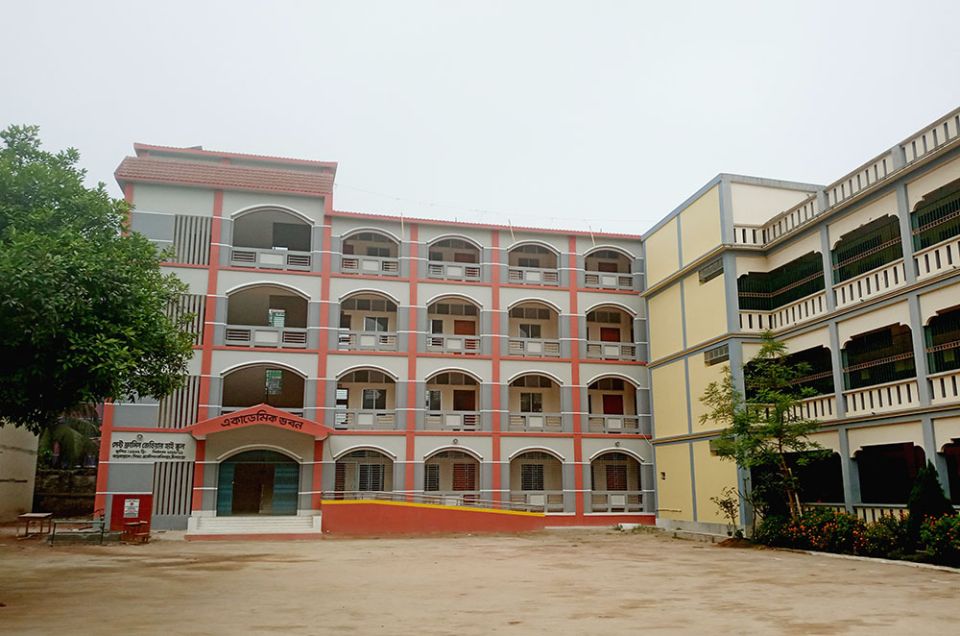 St. Francis Xavier High School's newest building, left, abuts a building that the Shanti Rani Sisters built in 2015 with their own funds. (Sumon Corraya)