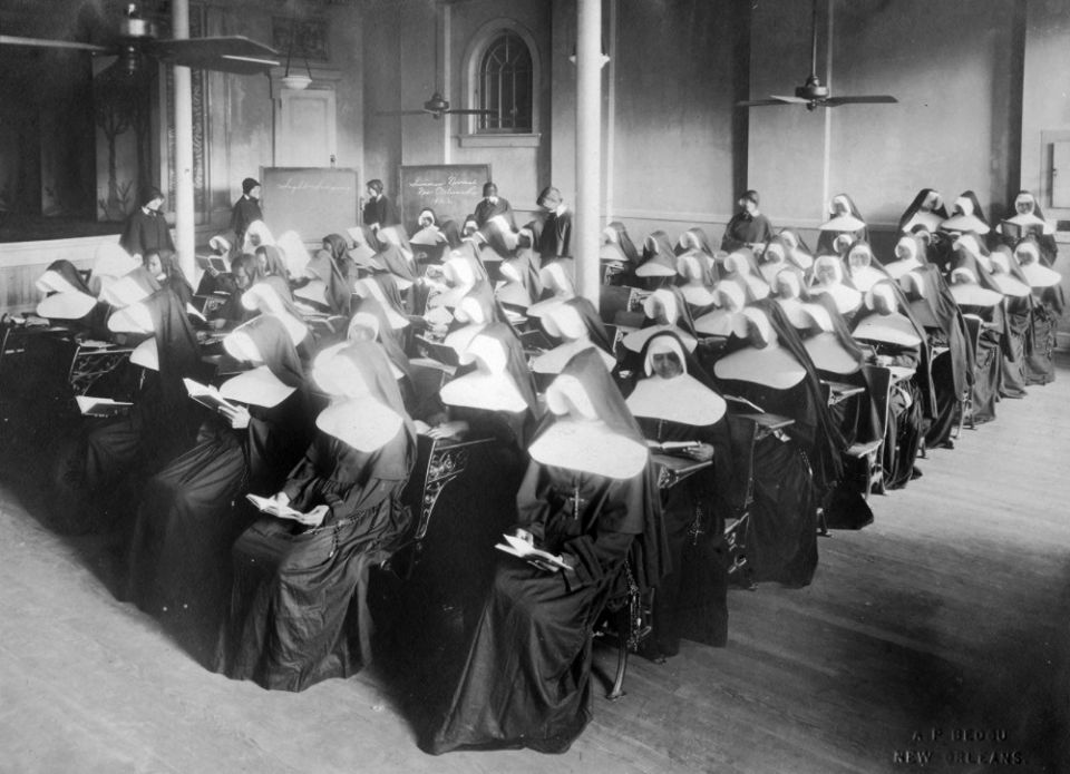 Sisters of Charity of Seton Hill, in black veils in the back, teach Sisters of the Holy Family to prepare them for the Louisiana state teaching exams in the 1920s. (Courtesy of the Archives of the Sisters of Charity of Seton Hill)