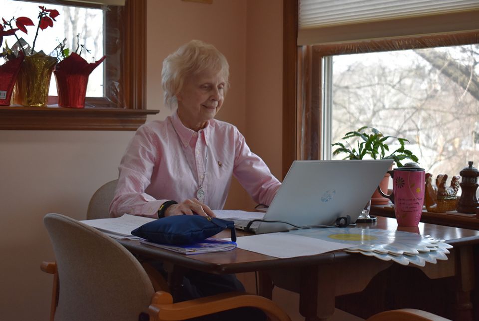 Sr. Suzanne Susany of the Sisters of St. Francis of the Neumann Communities assists immigrants from home in Pittsburgh during the pandemic. (Julie A. Ferraro) Sr. Suzanne Susany of the Sisters of St. Francis of the Neumann Communities assists immigrants from home in Pittsburgh during the pandemic. (Julie A. Ferraro)