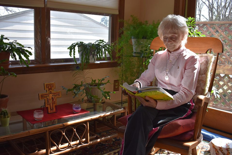 Sr. Suzanne Susany of the Sisters of St. Francis of the Neumann Communities prays in the prayer room at the Dwelling Place convent in Pittsburgh. (Julie A. Ferraro)