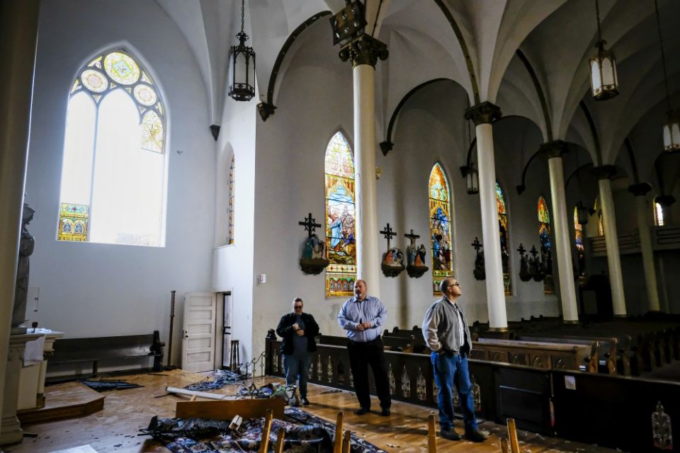 People look over the damage to the Church of the Assumption following a March 3 tornado in Nashville, Tennessee. (CNS / Tennessee Register / Rick Musacchio) People look over the damage to the Church of the Assumption following a March 3 tornado in Nashville, Tennessee. (CNS / Tennessee Register / Rick Musacchio)
