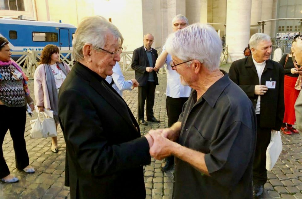 Tom Stang, right, meets retired Bishop Erwin Kräutler of Xingu, Brazil, at the Vatican's synod for the Amazon. Kräutler, a longtime environmental defender in the Amazon, was an ally of Notre Dame de Namur Sr. Dorothy Stang and presided at her funeral.