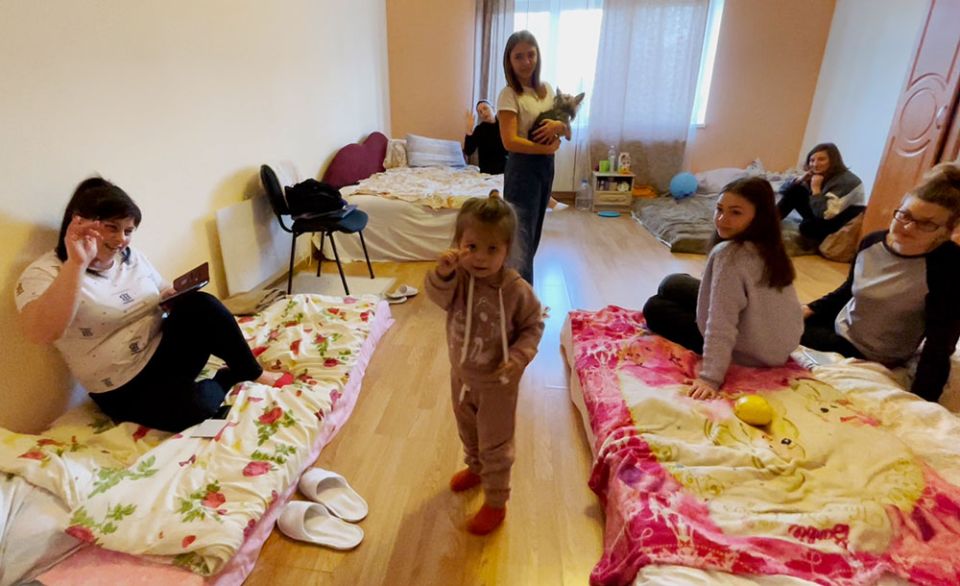 Refugees relax in their dormitory at the Convent of St. Joseph of Saint-Marc in Mukachevo, a town in western Ukraine. (Courtesy of Ligi Payyappilly)