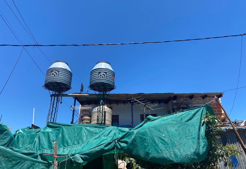 Politicians are known to court voters in the villas with gifts — in one case, Sr. Florencia Buruchaga said, with these water tanks, which arrived empty. (GSR photo/Soli Salgado)