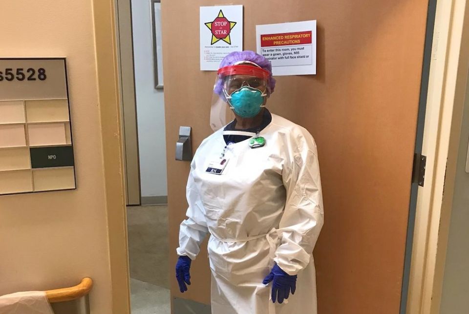 Sr. Vivien Echekwubelu, registered nurse and member of the Sisters of Notre Dame de Namur, in her protective gear on shift at a hospital in Baltimore, Maryland (Provided photo)
