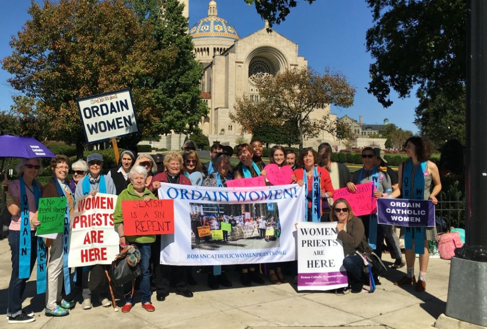 Activists rally in support of women's ordination Oct. 11 in front of the Basilica of the National Shrine of the Immaculate Conception. (GSR photo / Jesse Remedios)