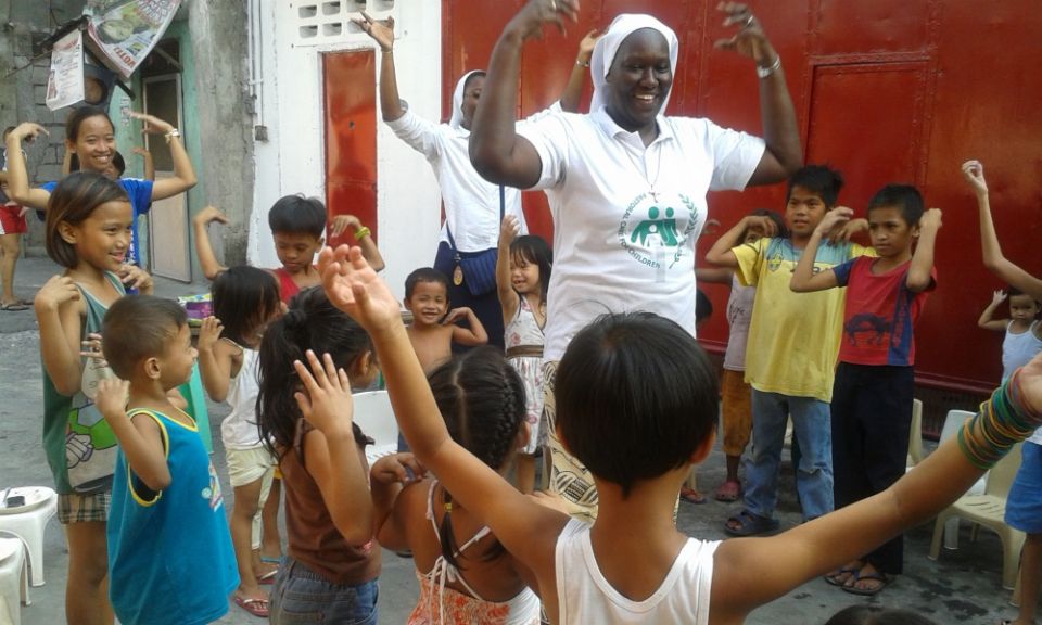 Sisters of Our Lady of the Immaculate Conception of Castres work with children from depressed areas at Emilie's Home in Quezon City, Philippines, in 2014. (Provided photo) Sisters of Our Lady of the Immaculate Conception of Castres work with children from depressed areas at Emilie's Home in Quezon City, Philippines, in 2014. (Provided photo)