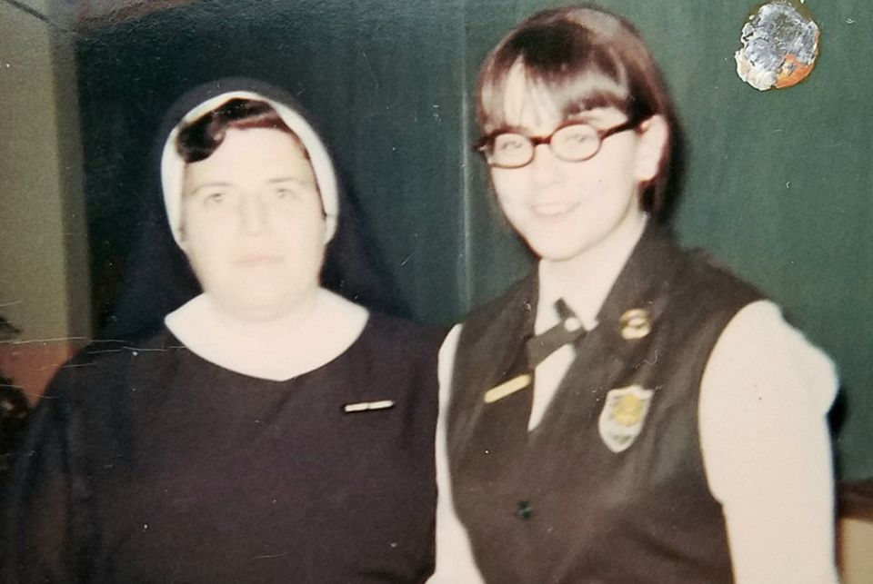 Cáit Finnegan, right, and Sister of Mercy Sr. Juanita Barto in Barto’s classroom at Mater Christi Diocesan High School in Queens, New York. Finnegan says her abuse began with Barto asking her to attend special meetings in her classroom. (Provided photo)
