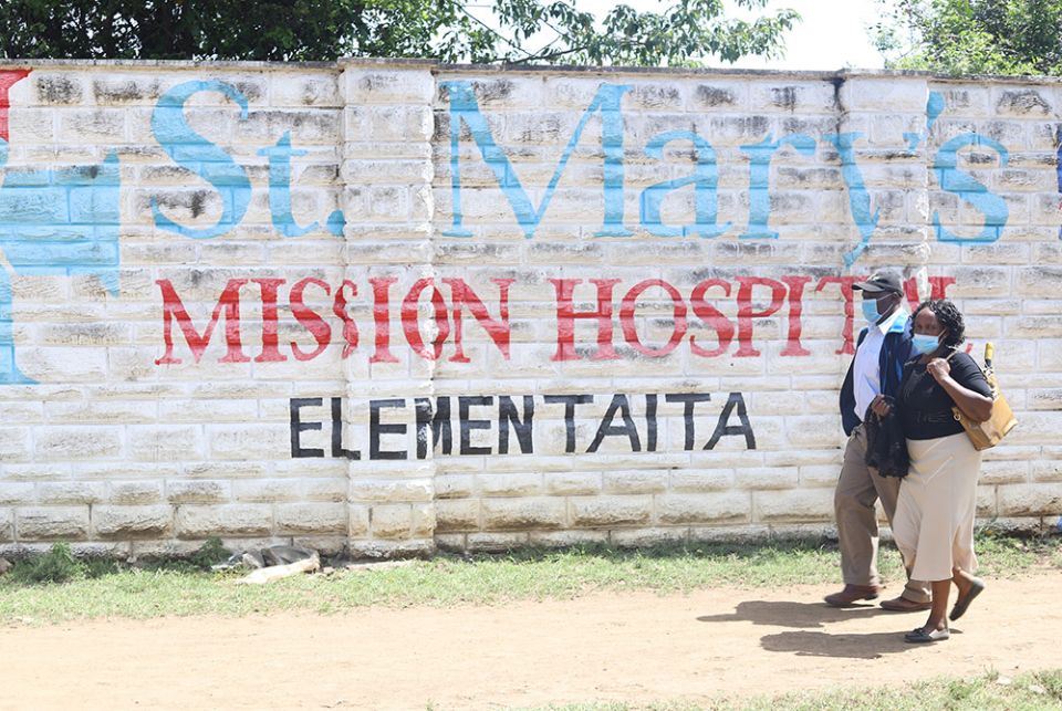 Patients seeking medical care walk towards the main entrance of St Mary's Mission Hospital Elementaita in Gilgil, in southwestern Kenya. This is a branch hospital of St. Mary’s Mission Hospital in Lang’ata, Nairobi. Patients of the hospitals say they are Patients seeking medical care walk towards the main entrance of St Mary's Mission Hospital Elementaita in Gilgil, in southwestern Kenya. This is a branch hospital of St. Mary’s Mission Hospital in Lang’ata, Nairobi. Patients of the hospitals say they are