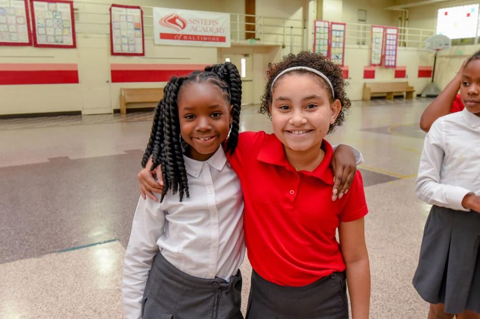 Two fifth-grade students in the Sisters Academy gym in the fall of 2018. 