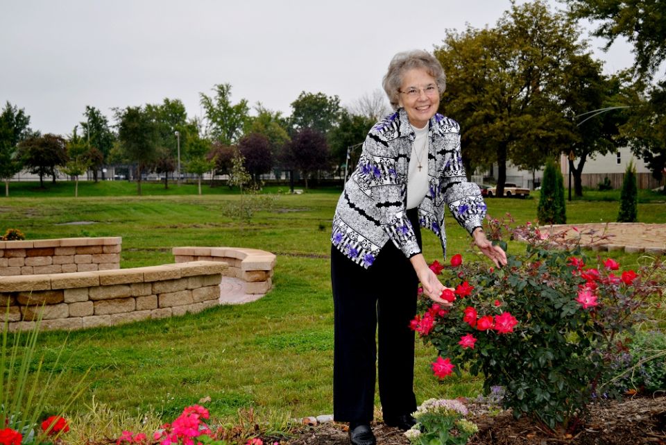 Sr. Donna Liette outside the Precious Blood Ministry of Reconciliation Center in Chicago: "There used to be no trees, no flowers. Now we have lots of flowers. It's a much prettier place." (Dave Eck)