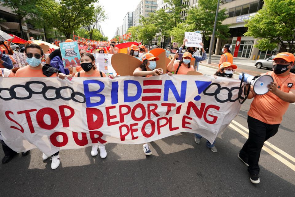 Immigration advocates hold a demonstration near the White House in Washington April 28 calling on President Joe Biden to secure a path to citizenship for immigrants living in the country illegally. (CNS/Reuters/Kevin Lamarque)