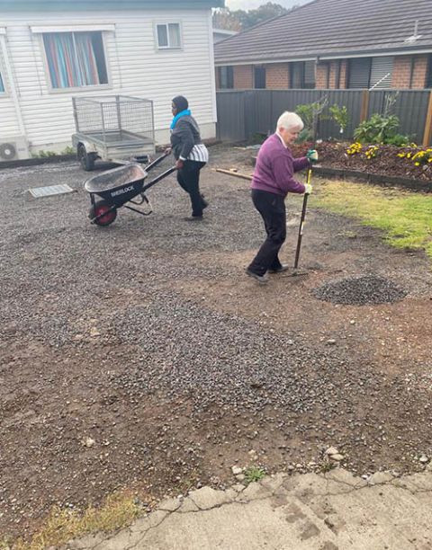In November 2021, Farida Baremgayabo (rear) took over as Zara's House project coordinator from Dominican Sr. Diana Santleben. Here, they work together on a new path for the refugee house in Newcastle, New South Wales, Australia. (Tracey Edstein)