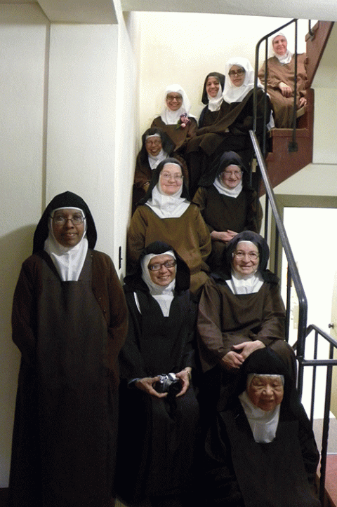 The Discalced Carmelites of Carmel, California, seen on the stairs of their monastery (Provided photo) The Discalced Carmelites of Carmel, California, seen on the stairs of their monastery (Provided photo)