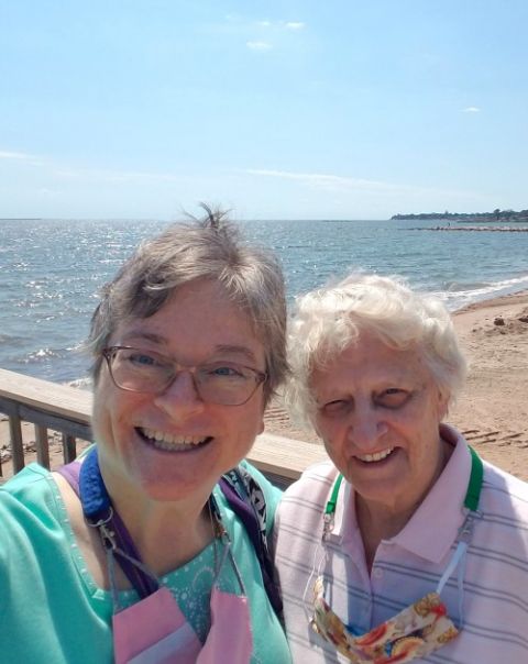 Dominican Srs. June Fitzgerald, left, and Julia Grey visit the West Haven, Connecticut, beach this summer. (Provided photo) Dominican Srs. June Fitzgerald, left, and Julia Grey visit the West Haven, Connecticut, beach this summer. (Provided photo)