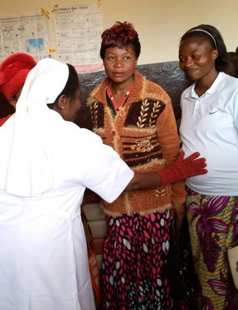 A sister cares for pregnant women at a clinic in Congo. (Courtesy of Rose Namulisa Balaluka)