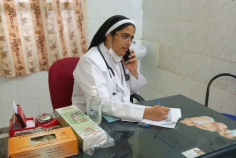 Sr. Lijo Joseph of the Congregation of Mother Carmel talks to a patient over the phone in her clinic in Chikmagalur Diocese, Karnataka, India. (Provided photo) Sr. Lijo Joseph of the Congregation of Mother Carmel talks to a patient over the phone in her clinic in Chikmagalur Diocese, Karnataka, India. (Provided photo)