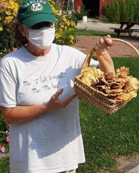 Dominican Volunteer Maureen Geglio shows off "hen of the woods" mushrooms, locally grown at her ministry site, the Eco-Justice Center, in Racine, Wisconsin in September 2020. (Provided photo) Dominican Volunteer Maureen Geglio shows off "hen of the woods" mushrooms, locally grown at her ministry site, the Eco-Justice Center, in Racine, Wisconsin in September 2020. (Provided photo)