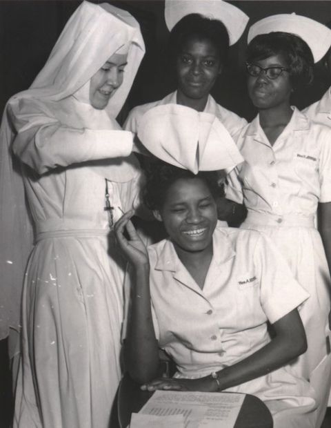 St. Joseph Sr. Barbara Lum, left, at a February 1965 capping ceremony in Selma, Alabama. (Courtesy of the Sisters of St. Joseph of Rochester) St. Joseph Sr. Barbara Lum, left, at a February 1965 capping ceremony in Selma, Alabama. (Courtesy of the Sisters of St. Joseph of Rochester)