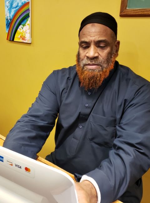 David Brown helps manage a used-clothing boutique store in Philadelphia run by Project HOME and rents and apartment in a building the agency built. (GSR file photo) David Brown helps manage a used-clothing boutique store in Philadelphia run by Project HOME and rents and apartment in a building the agency built. (GSR file photo)