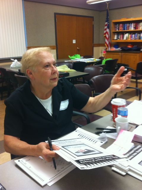 Sr. Maria Salerno, of the Sisters of St. Francis of the Neumann Communities, has long volunteered with the Onondaga County Election Department in central New York. Here, she is seen working the polls in a previous (pre-pandemic) election, and Salerno plan