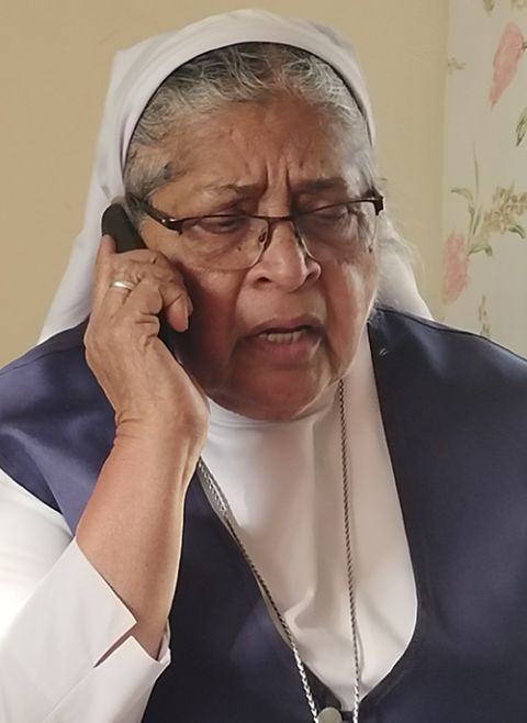 St Joseph of Tarbes Sr. Mary Mascarenhas attends to a phone call from a rehabilitated patient. (Thomas Scaria)