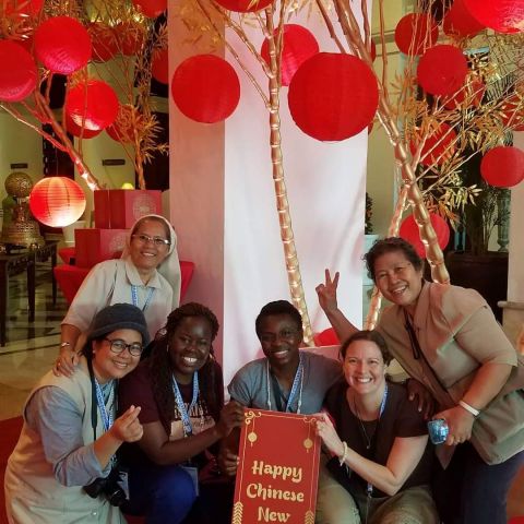 Sisters from the Sisters For Christian Community pose with some Chinese New Year decorations during the community's 2019 international assembly in Manila, the Philippines, in January 2019. (Courtesy of Sr. Margaret Gonsalves) 