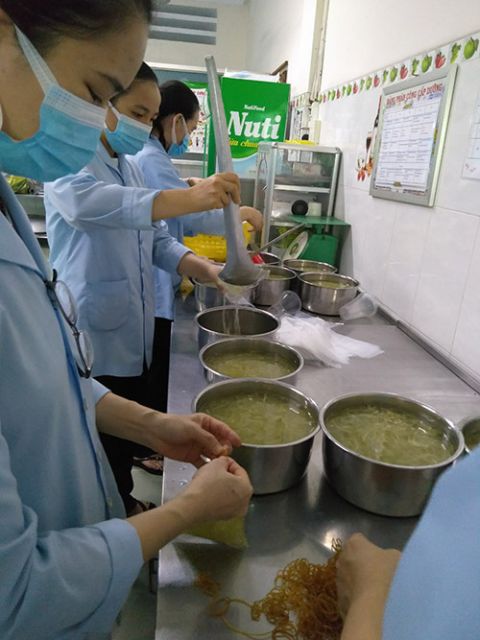 Lovers of the Holy Cross sisters cook food at their convent in Ho Chi Minh City, Vietnam. (Courtesy of Mary Pham Thi Huong)