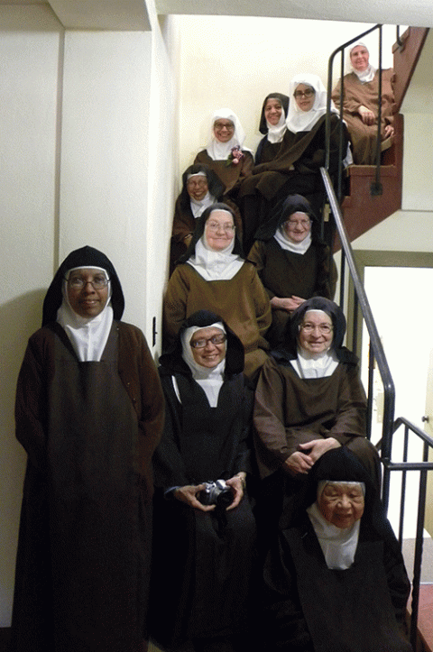 The Discalced Carmelites of Carmel, California, seen on the stairs of their monastery (Provided photo) The Discalced Carmelites of Carmel, California, seen on the stairs of their monastery (Provided photo)