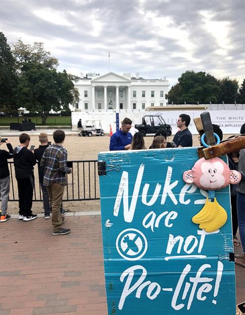 A sign denouncing nuclear weapons near the White House in Washington on Oct. 25, 2019 (CNS/Tyler Orsburn)
