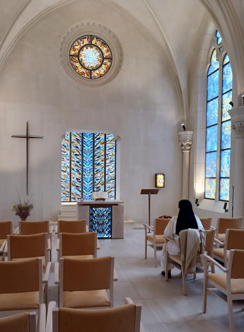 Sister prays in chapel.