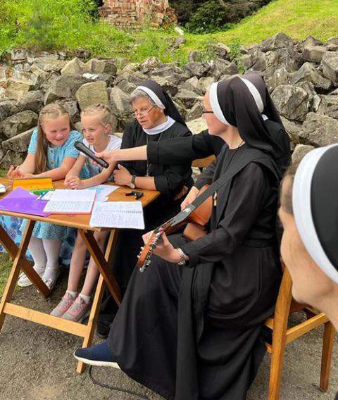 Basilian Sisters in Korchyn, Ukraine, with children of war (Courtesy of Sisters of the Order of Saint Basil the Great)