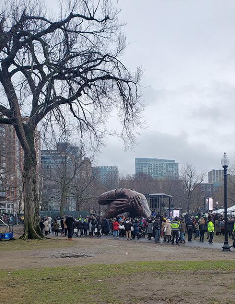 From outside the fence line, a view of "The Embrace" at its unveiling Jan. 13 (Colleen Gibson)
