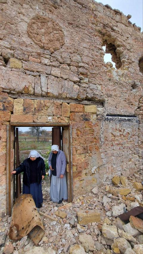 Sisters in a ruined Catholic church in Ukraine. They worked here before the war. (Courtesy of Scholastica Oleksandra Hulivata)