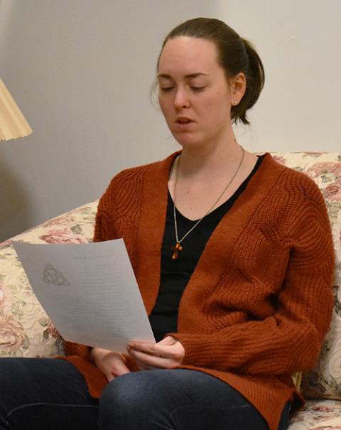 Rachel Dunlap, novice with the Sisters of the Presentation of the Blessed Virgin Mary, reads during evening prayer at the InterCongregational Collaborative Novitiate in Chicago. (Julie A. Ferraro)