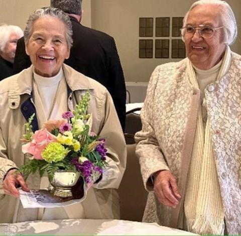 Srs. Edith Lugo and Teresa Aguiñaga, both Guadalupan Missionaries of the Holy Spirit, enjoy the reception for Sr. Maria Eugenia Moreno's 50th  jubilee of religious life in Birmingham, Alabama. (Courtesy of Maria Elena Méndez Ochoa)