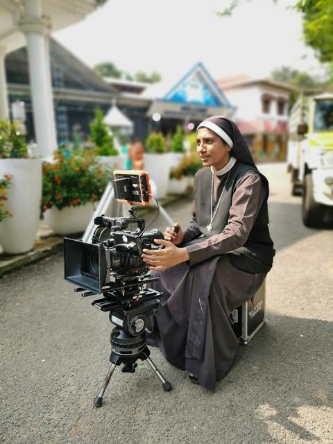 Carmelite Sr. Lismy Parayil with her camera during one of her short film shoots (Courtesy of Sr. Lismy Parayil)