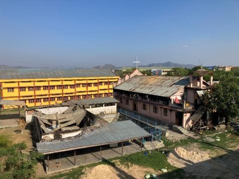 The Holy Redeemer Catholic Church and the boy's hostel in Canchipur in the Imphal Valley, torched by mobs (Courtesy of the Archdiocese of Imphal)